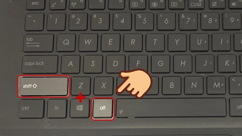 Bàn phím laptop với các phím Shift, Alt được đánh dấu